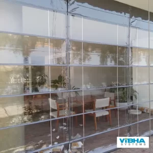 Monsoon blinds for protecting Chennai buildings from rain.