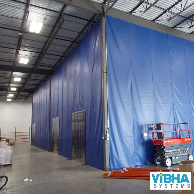 Warehouse partition curtains for Bangalore distribution centers.